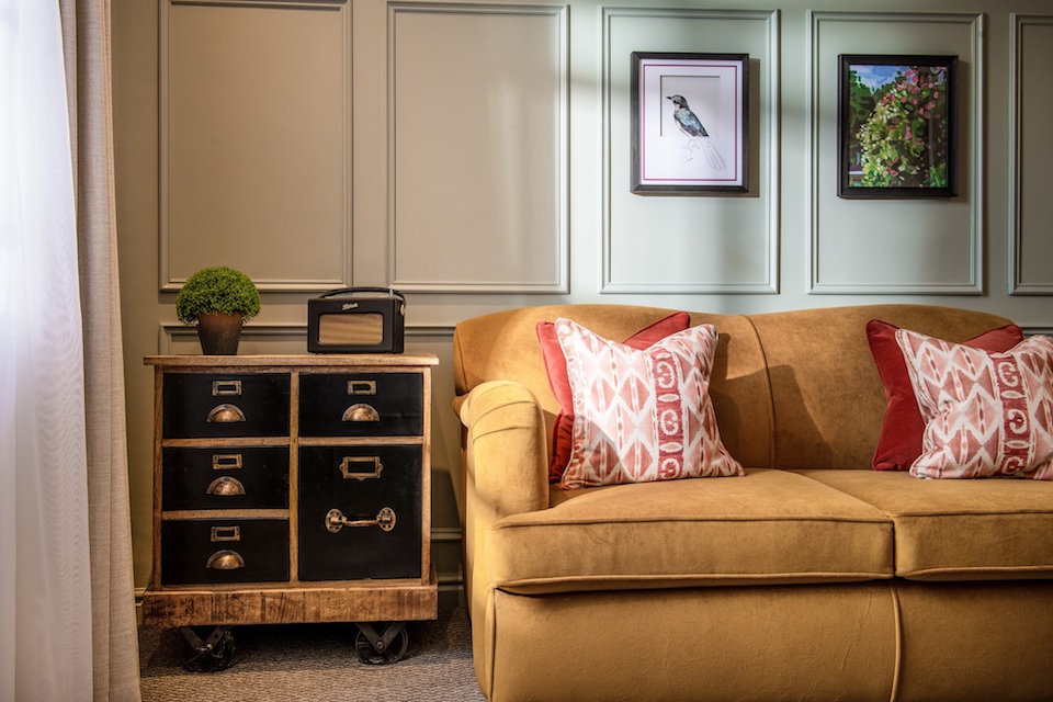 Seating area in one of the renovated bedrooms at Middletons Hotel