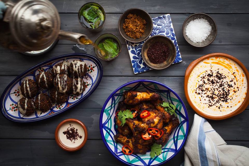 Los Moros North African cuisine selection of plates and hummus