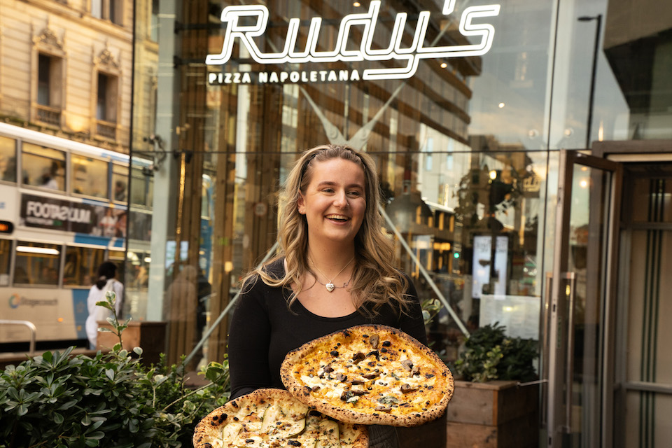 Rudy's Pizza York Opening - outside shot of staff and pizza