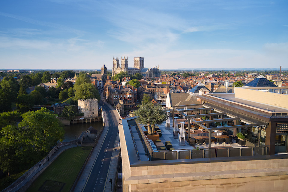 Sora Sky Bar York - drone shot of outside terrace in summer with minster view