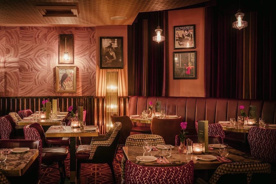 Nola in York, dusty pink interior with candlelit tables
