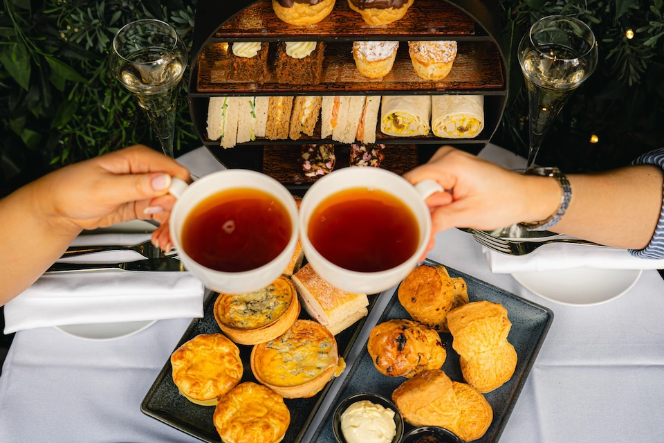 Dakota afternoon tea, Lees. Two cups cheersing