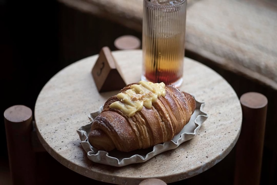 Sonder Leeds cafe croissant on the table